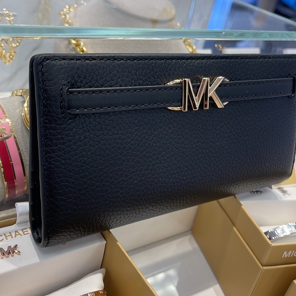 Michael Kors Handbags - Michael Kors Reed Large Bifold Pebbled Leather Snap Wallet Card Case
Black
NWT